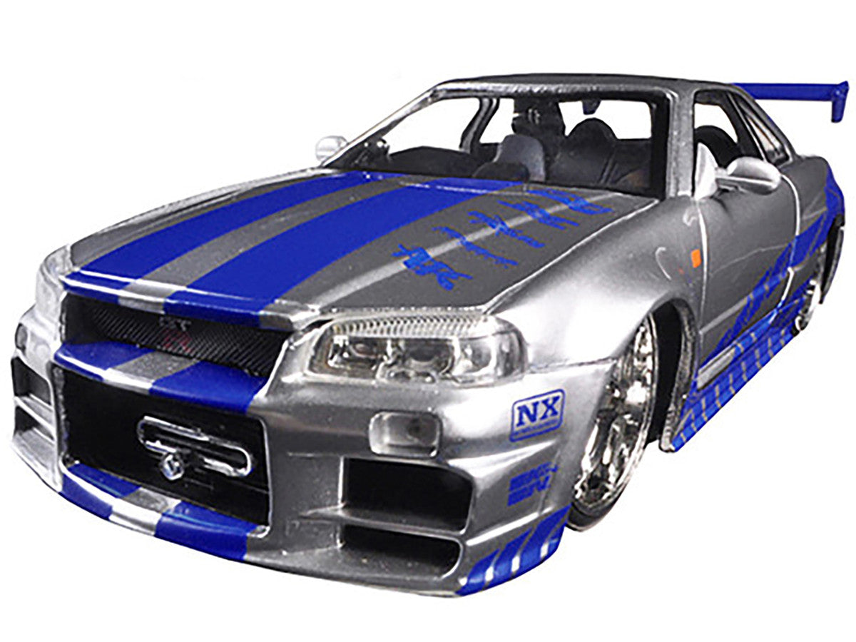 Brian's Nissan GTR Skyline R34 RHD (Right Hand Drive) Silver with Blue Stripes "Fast & Furious 25th Anniversary" 1/24 Diecast Model Car by Jada