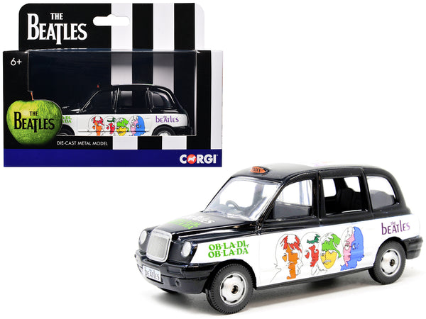 The Beatles London Taxi RHD (Right Hand Drive) "Ob-La-Di Ob-La-Da" Black and White with Graphics Diecast Model by Corgi